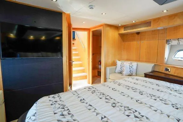 Slide: The Image of Luxurious Sunseeker 88 Yacht 2012 bedroom with modern decor and large TV. - 40