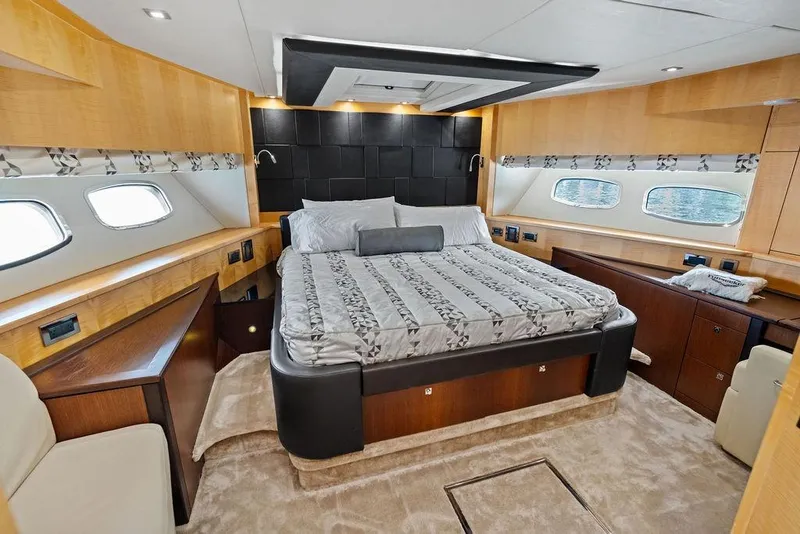 Slide: The Image of Luxurious bedroom interior of 2012 Sunseeker 88 Yacht with elegant wood finishes and large bed. - 53