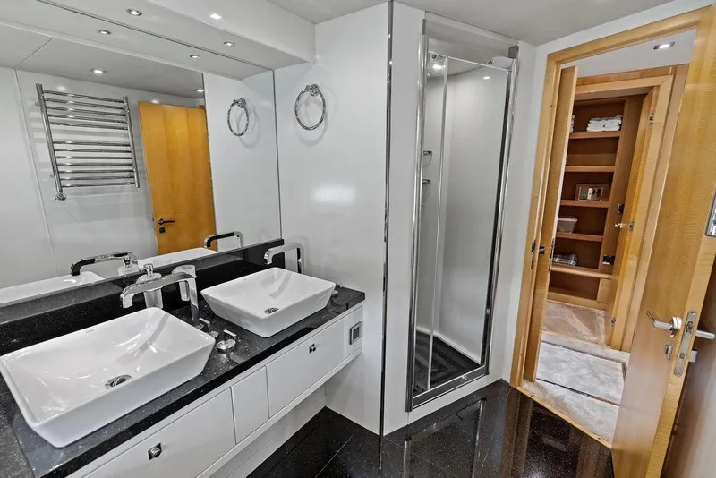 Slide: The Image of Luxurious bathroom on 2012 Sunseeker 88 Yacht with dual sinks and modern shower. - 57