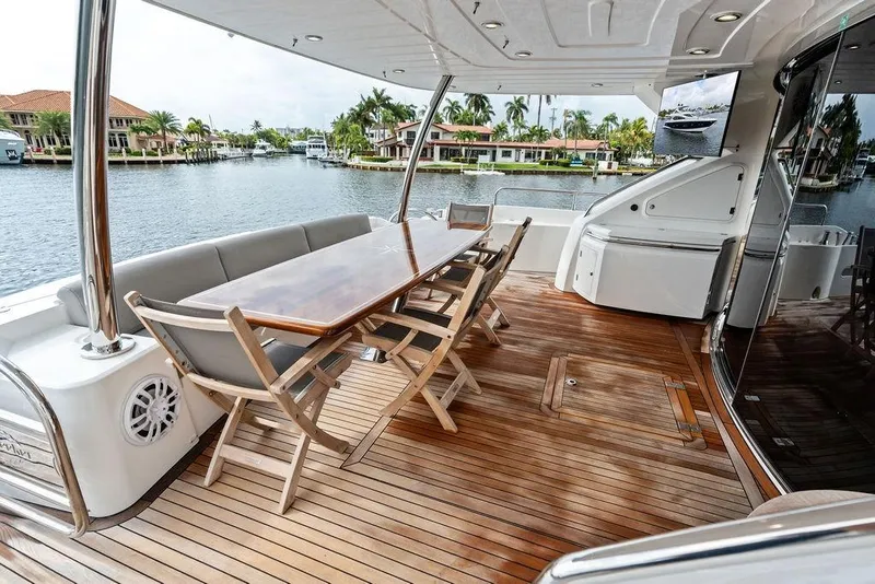 Slide: The Image of Luxurious Sunseeker 88 Yacht 2012 with elegant outdoor dining area and waterfront view. - 65