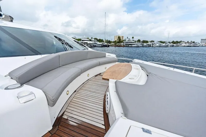 Slide: The Image of Luxurious Sunseeker 88 Yacht 2012 with elegant deck seating and scenic marina view. - 69