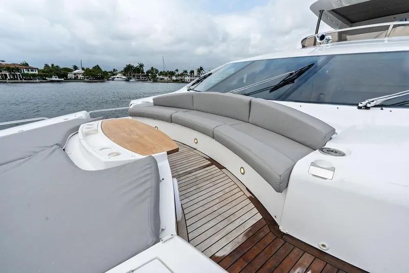 Slide: The Image of Luxurious Sunseeker 88 Yacht 2012 with elegant deck seating and scenic waterfront view. - 71
