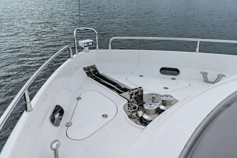 Slide: The Image of Bow view of 2012 Sunseeker 88 Yacht, showcasing anchor and winch system. - 72