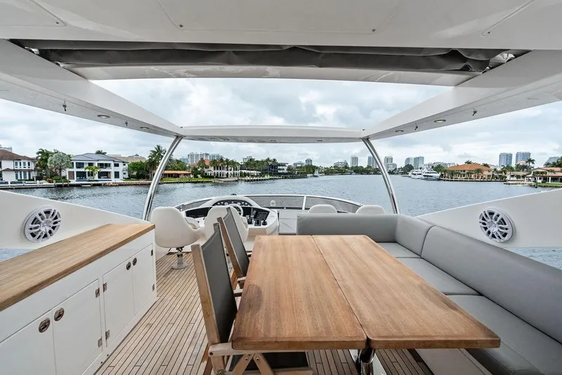 Slide: The Image of Luxurious Sunseeker 88 Yacht 2012 with spacious deck and scenic waterfront view. - 87