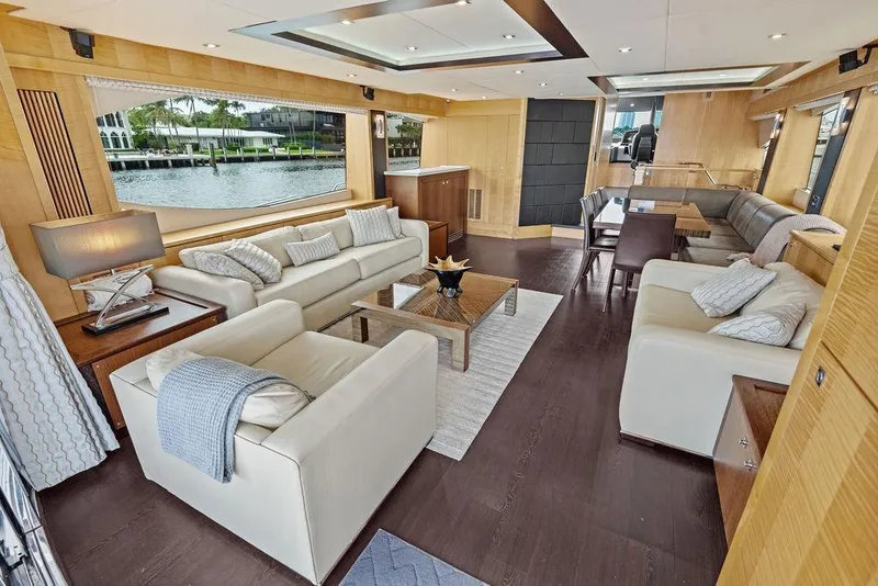 Slide: The Image of Luxurious interior of 2012 Sunseeker 88 Yacht with elegant seating and large windows. - 91