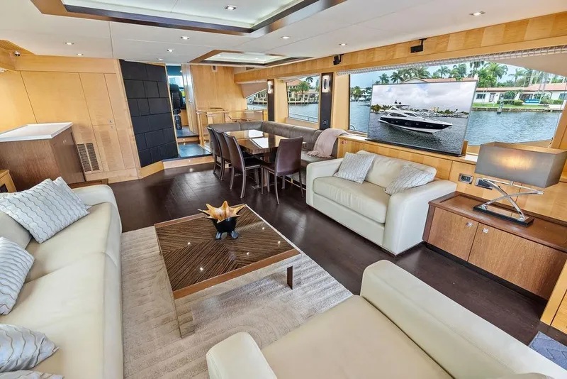 Slide: The Image of Luxurious interior of 2012 Sunseeker 88 Yacht with elegant seating and dining area. - 92