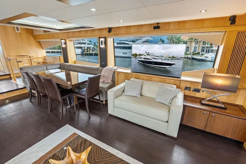 Slide: The Image of Luxurious interior of 2012 Sunseeker 88 Yacht with elegant dining and seating area. - 93