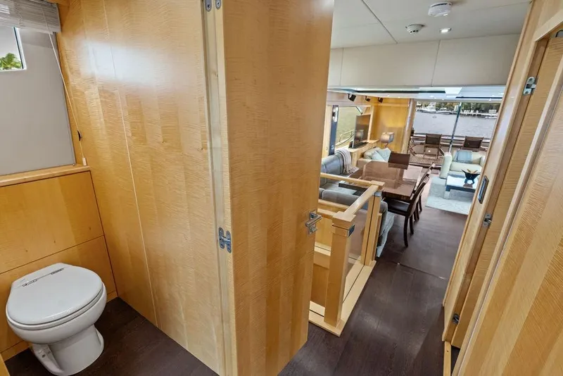 Slide: The Image of Luxurious interior of 2012 Sunseeker 88 Yacht with wooden finishes and elegant furnishings. - 96