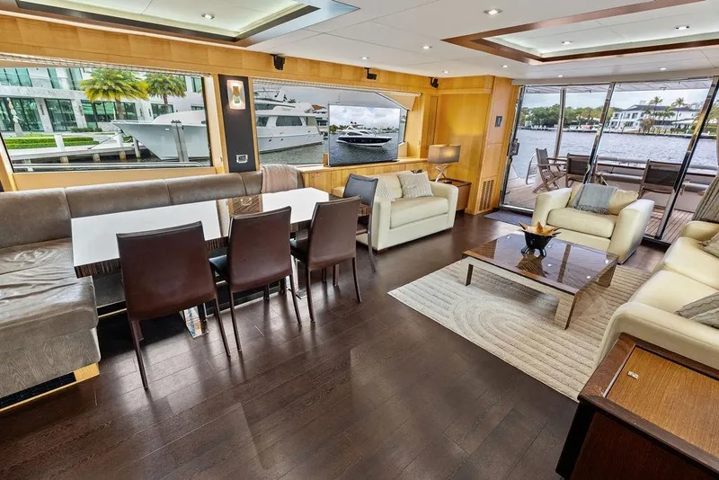 Slide: The Image of Luxurious interior of 2012 Sunseeker 88 Yacht with elegant seating and dining area. - 98