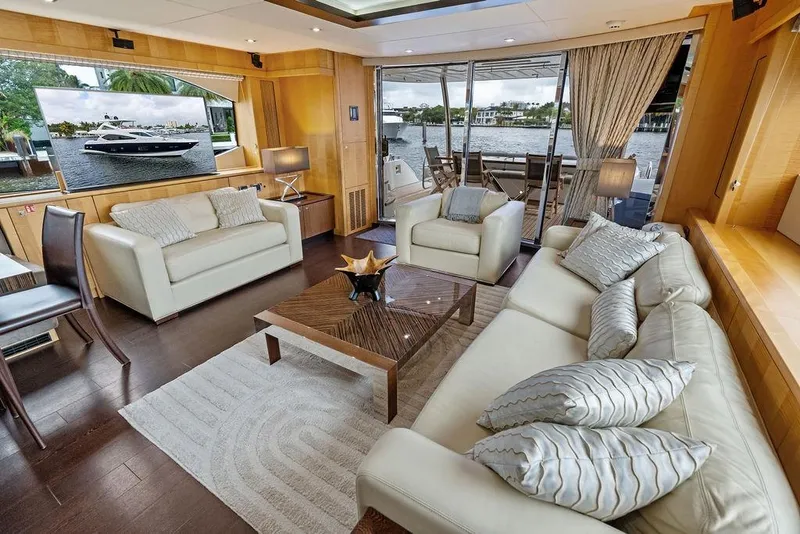 Slide: The Image of Luxurious interior of 2012 Sunseeker 88 Yacht with elegant seating and scenic views. - 99