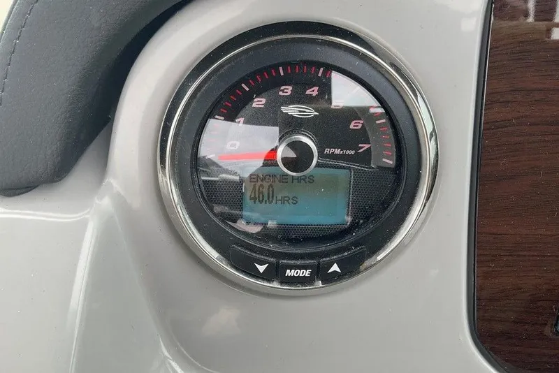 Slide: The Image of Dashboard gauge of 2023 Chaparral 23 SSi showing 46 engine hours. - 15