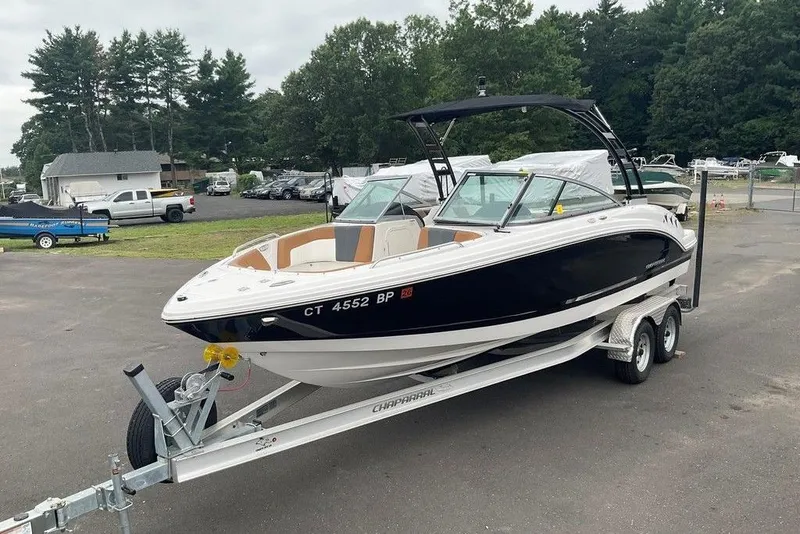 Slide: The Image of 2023 Chaparral 23 SSi boat on trailer in outdoor setting. - 5