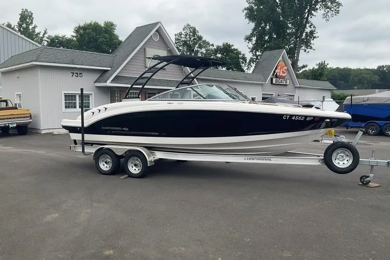 Slide: The Image of 2023 Chaparral 23 SSi boat on trailer outside dealership. - 6