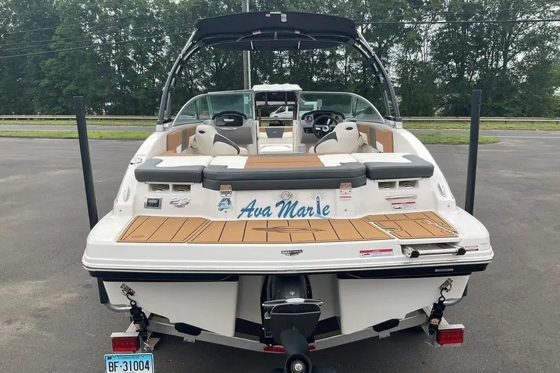 Slide: The Image of 2023 Chaparral 23 SSi boat with custom name "Ava Marie" on the stern. - 8