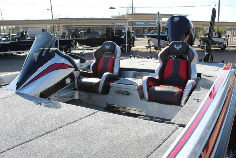 Slide: The Image of 2026 Phoenix 921 Elite X boat interior with sleek seats and modern design. - 15