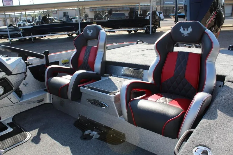 Slide: The Image of 2026 Phoenix 921 Elite X boat interior with red and black seats. - 22