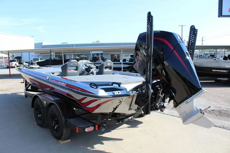 Slide: The Image of 2026 Phoenix 921 Elite X boat with powerful outboard motor on trailer. - 3
