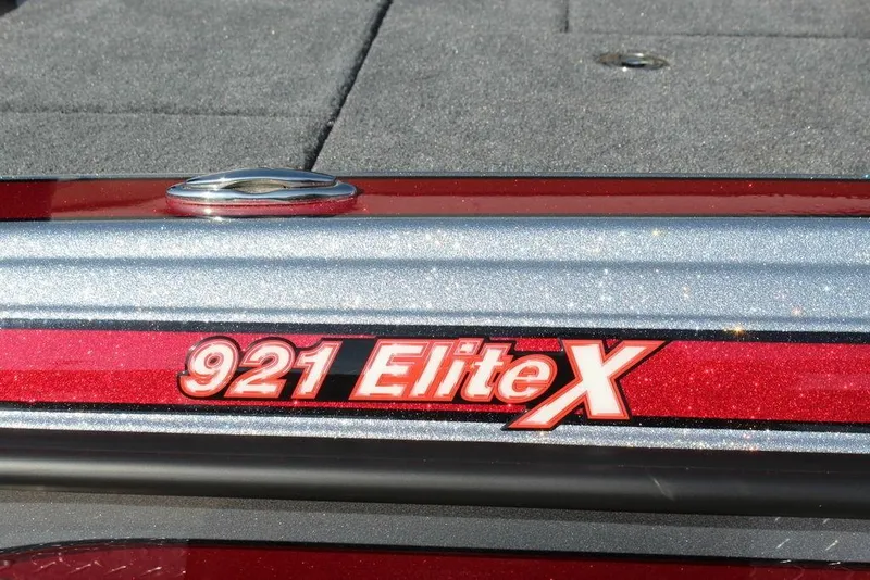 Slide: The Image of Close-up of 2026 Phoenix 921 Elite X boat logo on metallic surface. - 8