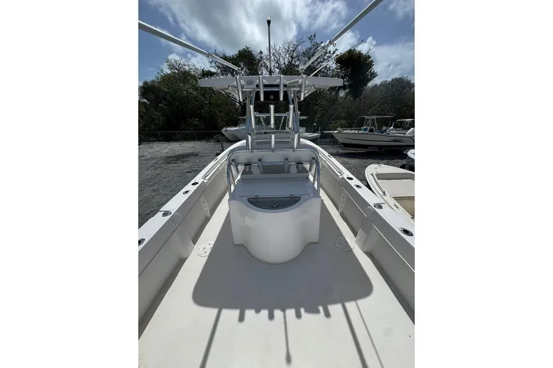 Slide: The Image of 2019 Twin Vee 26 Center Console boat, featuring spacious deck and center console. - 1