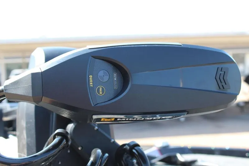 Slide: The Image of Close-up of 2026 Skeeter ZXE20 boat motor component, featuring sleek design and branding. - 15