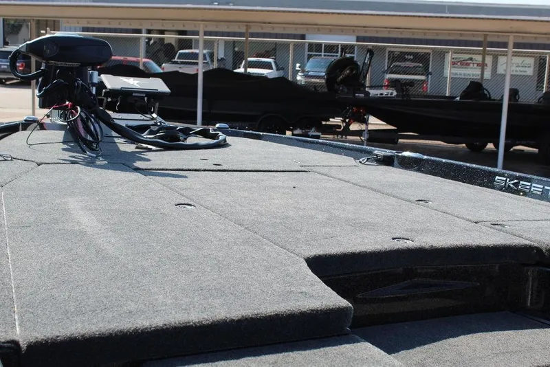 Slide: The Image of 2026 Skeeter ZXE20 boat deck with advanced equipment and sleek design. - 16