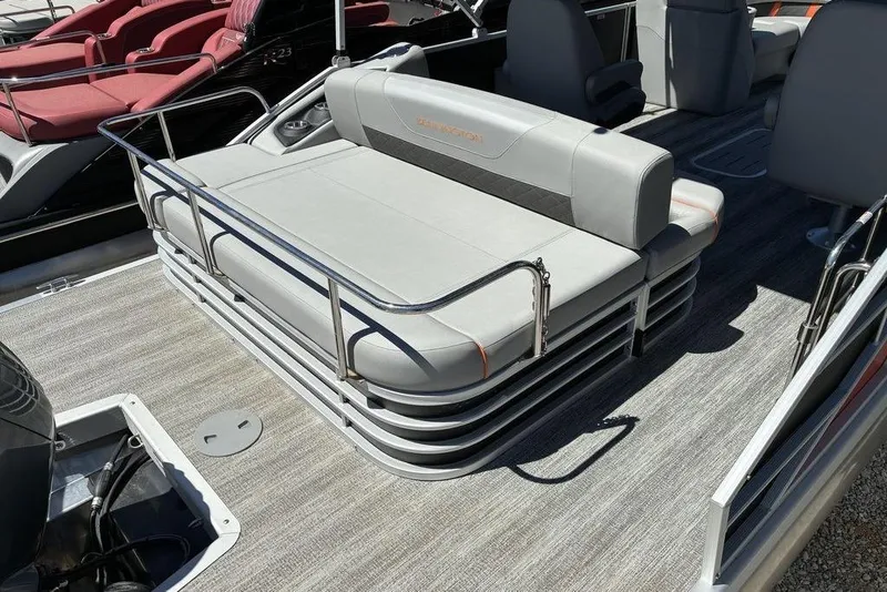 Slide: The Image of 2025 Bennington 22 SX Swingback pontoon boat with gray seating and sleek design. - 3