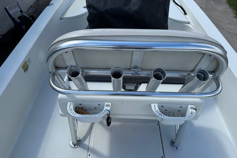 Slide: The Image of 2011 Ranger 2400 Bay Ranger boat with rod holders and seating. - 18