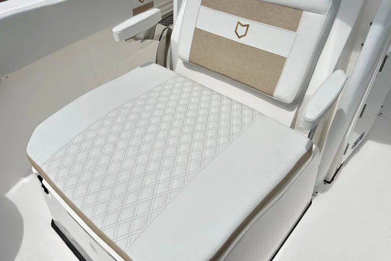 Slide: The Image of Luxurious seating on 2026 Sea Fox 268 Commander boat, featuring diamond-stitched upholstery and armrests. - 13