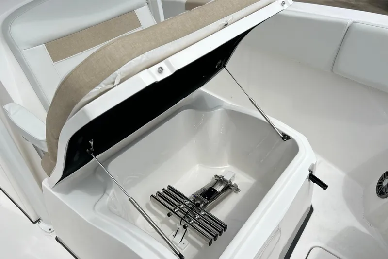 Slide: The Image of 2026 Sea Fox 268 Commander boat storage compartment with open lid and hydraulic support. - 15