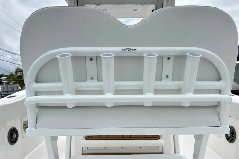 Slide: The Image of 2026 Sea Fox 268 Commander boat rod holders and seating detail. - 23