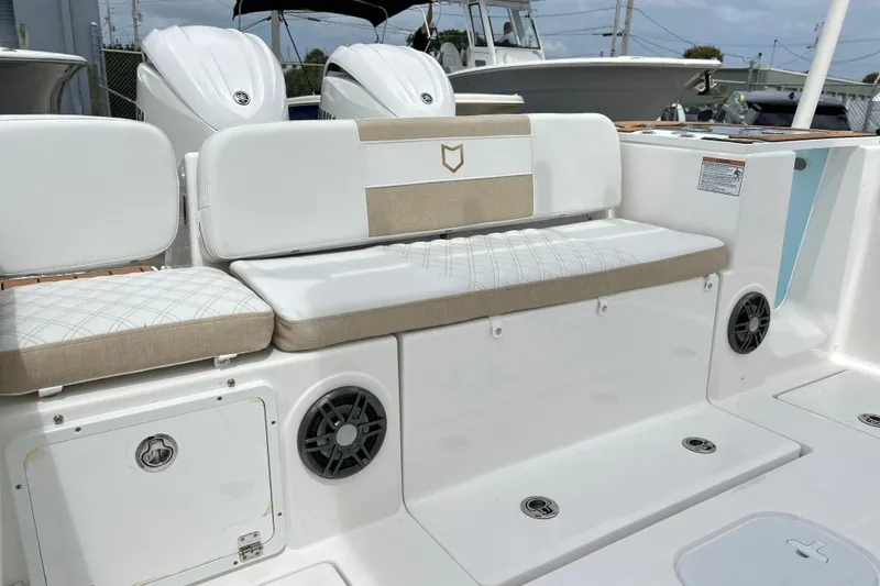 Slide: The Image of 2026 Sea Fox 268 Commander boat interior with cushioned seating and speakers. - 30