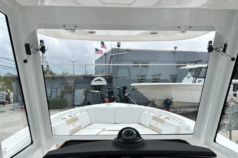 Slide: The Image of Interior view of 2026 Sea Fox 268 Commander boat, showcasing seating and navigation compass. - 34