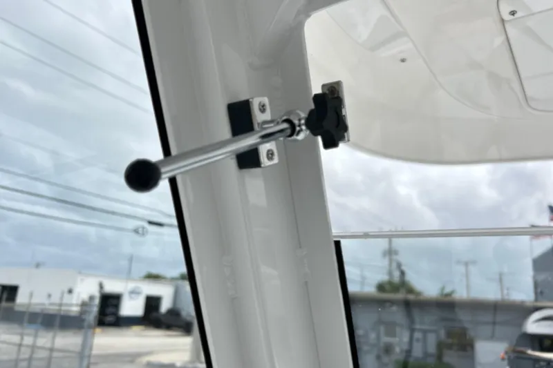 Slide: The Image of Close-up of a 2026 Sea Fox 268 Commander boat window latch mechanism. - 35
