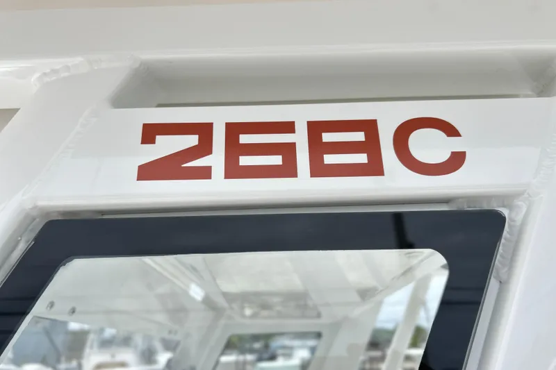 Slide: The Image of Close-up of 2026 Sea Fox 268 Commander boat window with red lettering. - 39