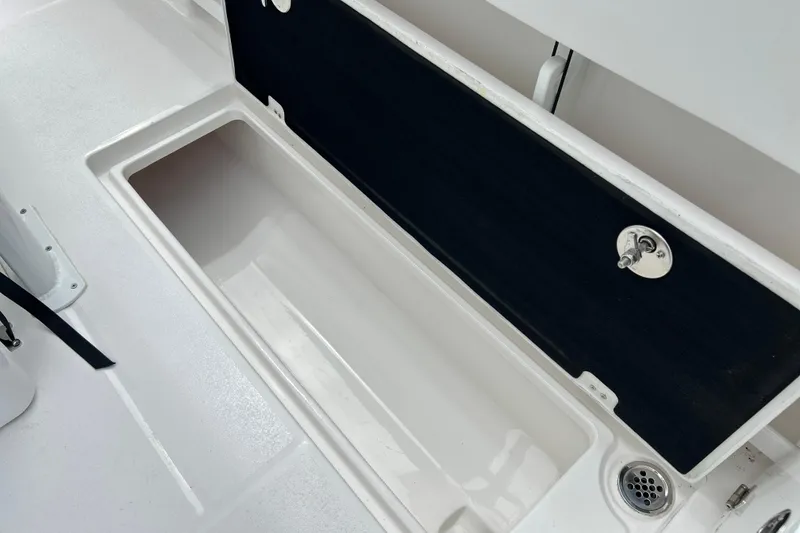 Slide: The Image of Open storage compartment on 2026 Sea Fox 268 Commander boat deck. - 40