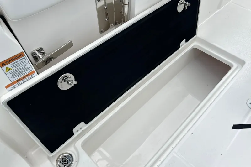 Slide: The Image of Open storage compartment on 2026 Sea Fox 268 Commander boat deck. - 41