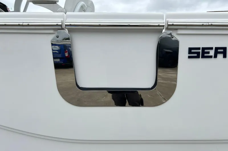Slide: The Image of 2026 Sea Fox 268 Commander boat detail with chrome accents and logo. - 49