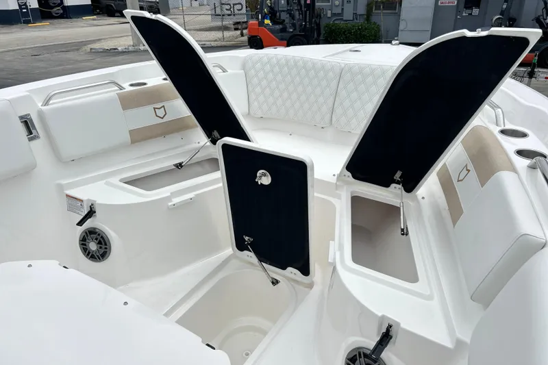 Slide: The Image of 2026 Sea Fox 268 Commander boat interior with open storage compartments and seating. - 5
