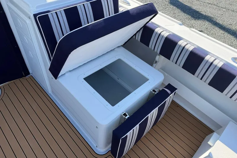 Slide: The Image of Steiger Craft 28 Annapolis 2026, seating with storage compartment. - 12
