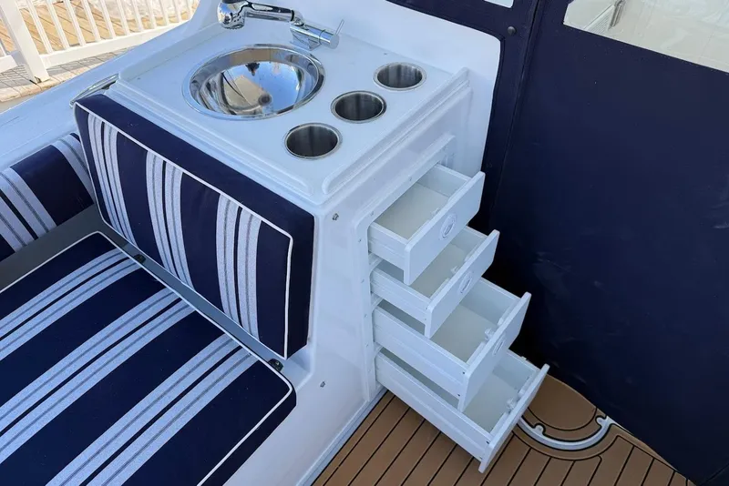 Slide: The Image of Interior of Steiger Craft 28 Annapolis 2026 with sink and drawers. - 13