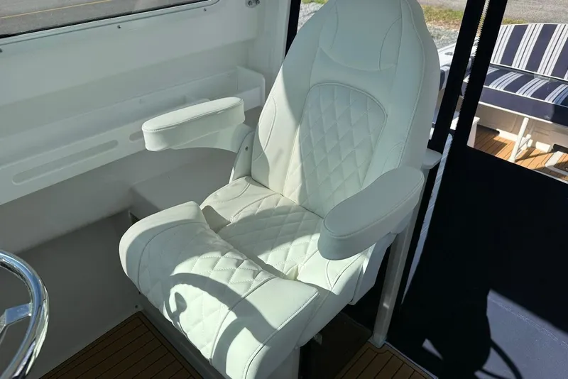Slide: The Image of Luxurious seat in Steiger Craft 28 Annapolis boat, year 2026. - 18