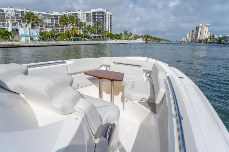 Slide: The Image of Luxurious 2024 Tiara Yachts 43 LS boat interior with waterfront cityscape view. - 18