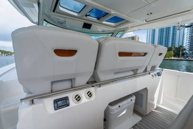 Slide: The Image of 2024 Tiara Yachts 43 LS interior seating with modern design and waterfront view. - 30
