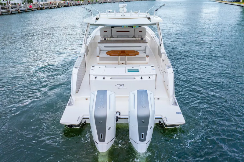 Slide: The Image of 2024 Tiara Yachts 43 LS with dual engines on the water. - 5
