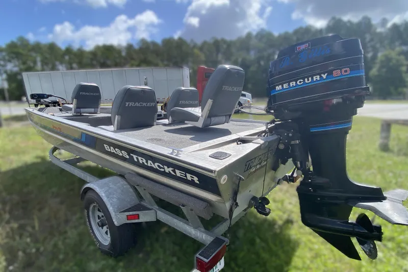 Slide: The Image of 1994 Tracker Pro Guide V-17 SC boat with Mercury 80 outboard motor on trailer. - 4