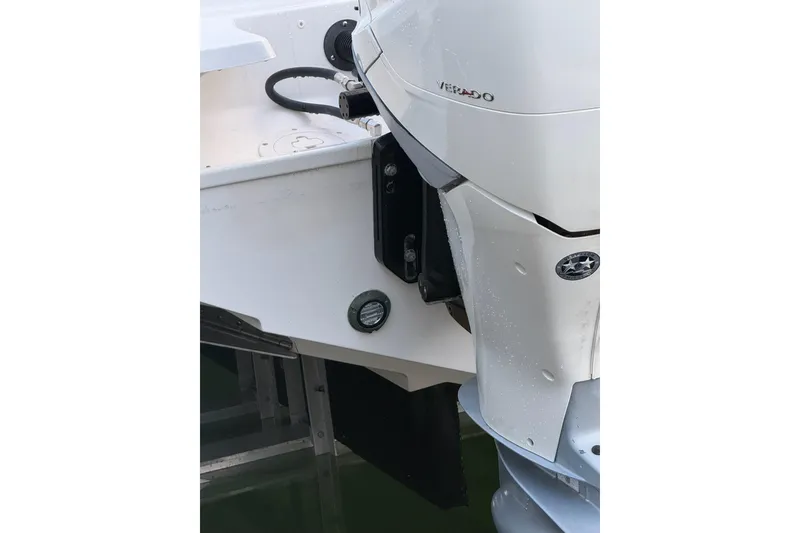 Slide: The Image of 2023 Boston Whaler 380 Outrage boat engine detail with Verado branding. - 22