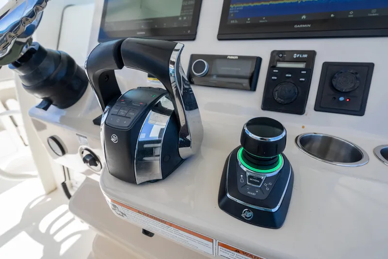 Slide: The Image of Control panel of 2020 Boston Whaler 380 Outrage with advanced navigation systems. - 26