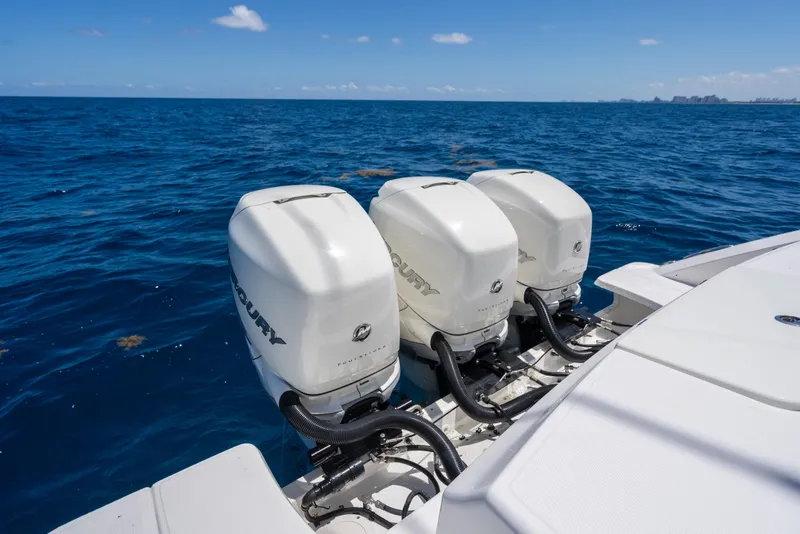 Slide: The Image of Triple Mercury outboard engines on a 2020 Boston Whaler 380 Outrage in open ocean. - 27