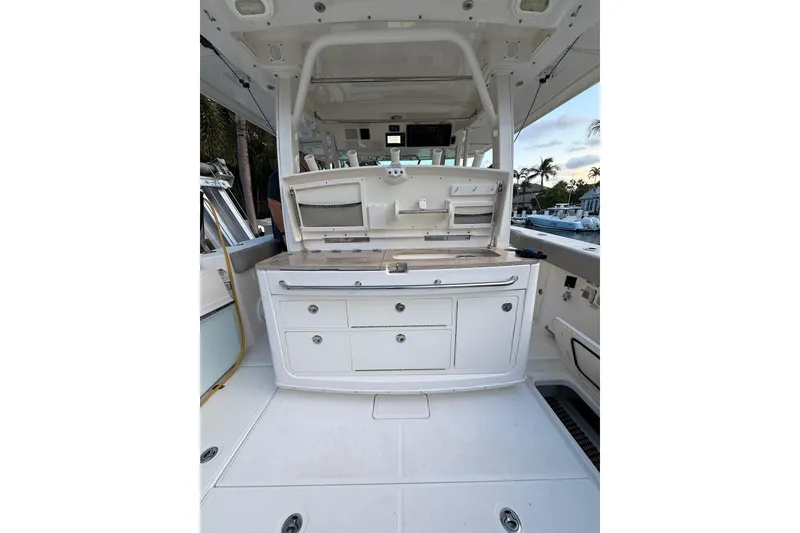 Slide: The Image of 2023 Boston Whaler 380 Outrage boat interior with storage and work area. - 8
