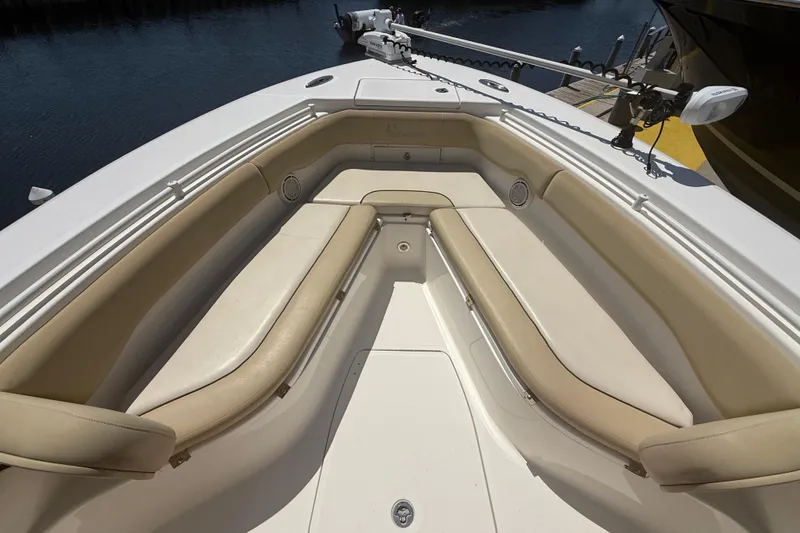 Slide: The Image of 2019 Key West Billistic 281 Center Console boat with spacious seating area. - 100